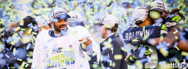 Russell Wilson celebrates after the Seahawks beat the Packers for the NFC Championship on Jan. 18 in Seattle. (Joshua Trujillo/seattlepi.com)
