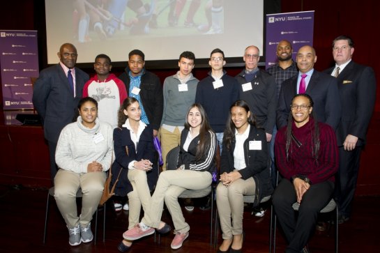 Central High School students and Athletic Director Jay Silverman pose with the "Captains for Life" panel. ©NYU Photo Bureau: Elena Olivo 
