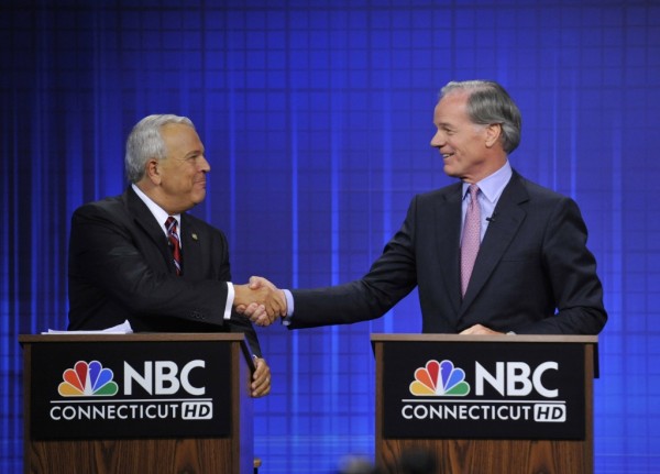 Republican candidates for governor Michael Fedele, left, and Tom Foley, right, shake hands at the end of their live televised debate in West Hartford, Conn., on Wednesday, July 14, 2010. (AP Photo/Jessica Hill)