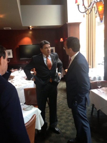 Gov. Dannel P. Malloy  (D) makes an impromptu stop at a Hartford luncheon where Texas counterpart Rick Perry (R) courts Connecticut businesses to move to his state, including firearms companies. Photo courtesy of Andrew Doba's Twitter feed. 