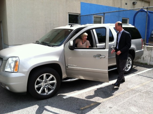 Linda McMahon delivers her 2009 GMC Denali, her official campaign vehicle during his 2010 and 2012 Senate candidacies, to Jason Shaplen, CEO of Inspirica. McMahon donated the vehicle to the Stamford non-profit to assist homeless clients with transportation to important job interviews and medical appointments. 