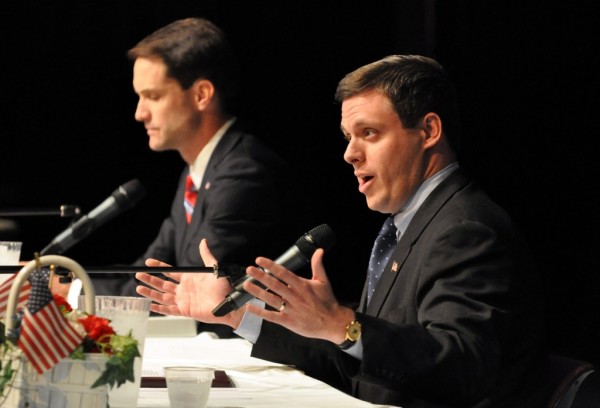 Republican Congressional candidate Dan Debicella, right, answers a question as his opponent Congressman Jim Himes looks on during the 4th Congressional District Candidates' Debate sponsored by the League of Women Voters at Wilton High School on Sunday, Oct. 24, 2010.