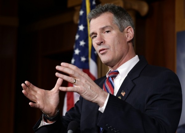 FILE - In this Nov. 13, 2012 file photo, Sen. Scott Brown, R-Mass., speaks during a media availability, on Capitol Hill in Washington. Brown, who was defeated in his re-election bid, said Friday, Feb. 1, 2013 that he will not run for the Senate seat vacated by John Kerry, who was named secretary of state. (AP Photo/Alex Brandon, File)