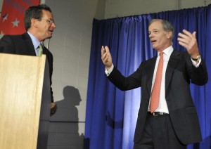 	Democratic candidate for governor Dannel Malloy, left, and Republican candidate Tom Foley, right, speak prior to a debate in Middletown, Conn., on Tuesday, Sept. 28, 2010. (AP Photo/Jessica Hill)