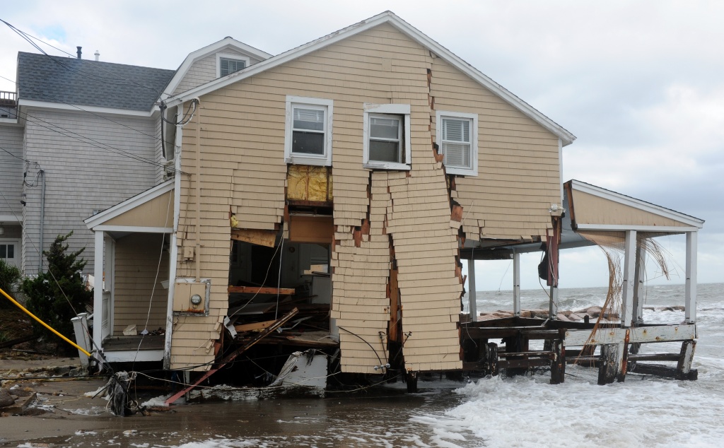 A house on Fairfield Beach Road in Fairfield was heavily damaged during Superstorm Sandy on Oct. 30, 2012. Sandy was one of the costliest storms in U.S. history, piling up some $70 billion in damage about $30 billion of which was insured, according to one estimate. Staff file photo by Autumn Driscoll. 