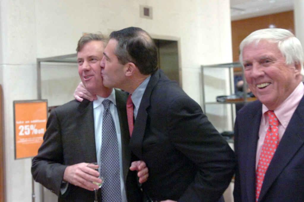 Ed Dadakis gives Ned Lamont a peck on the cheek to the amusement of Malcolm Pray as guests gather to roast former Republican Congressman Christopher Shays at Richards on Greenwich Avenue Wednesday, January 27, 2010. 