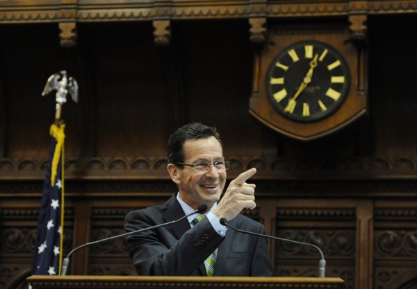 Connecticut Gov. Dannel P. Malloy addresses the House and the Senate at the end of session at the Capitol on the final day of session, Thursday, May 8, 2014, in Hartford, Conn. (AP Photo/Jessica Hill)
