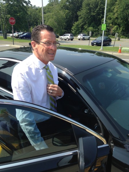 Gov. Dannel P. Malloy, leaves a bill signing ceremony at Weston High School, Monday, July 21, 2014. 