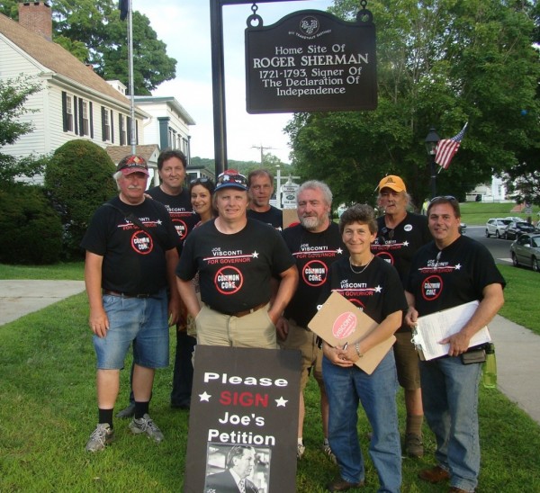 Petition candidate for governor Joe Visconti, second from left, collects signatures to get onto the November ballot near the New Milford green on July 26, 2014. Contributed photo. 