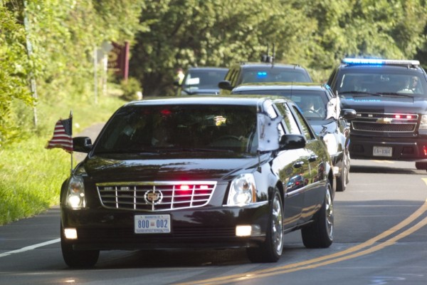 The motorcade carying Vice President Joe Biden and other Democratic officials travels north on North Street during the Vice President's fundraising trip to Greenwich, Conn., on Wednesday, Aug. 20, 2014.