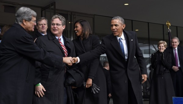 President Barack Obama shakes hands with former Senate Majority Leader Trent Lott of Mississippi, as Connecticut State Sen. Ted Kennedy Jr., watches during the dedication of the Edward M. Kennedy Institute for the United States Senate in Boston, Monday, March 30, 2015. The $79 million Edward M. Kennedy Institute for the United States Senate dedication is a politically star-studded event attended by President Barack Obama, Vice President Joe Biden and past and present senators of both parties. It sits next to the presidential library of Kennedys brother, John F. Kennedy. From left are, Lott, Massachusetts Gov. Charlie Baker, first lady Michelle Obama, the president, Sen. Elizabeth Warren, D-Mass., and Sen. Edward Markey, D-Mass.   (AP Photo/Susan Walsh)