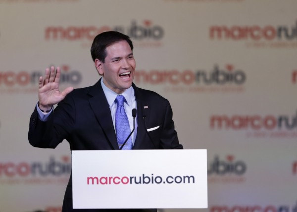 Florida Sen. Marco Rubio gestures as he speaks to supporters as he announces that he is running for the Republican presidential nomination, during a rally at the Freedom Tower, Monday, April 13, 2015, in Miami. (AP Photo/Wilfredo Lee)