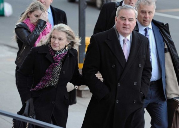 Former Connecticut Gov. John Rowland arrives with his wife Patty Rowland, left, at federal court in New Haven, Wednesday, March 18, 2015, in New Haven, Conn. A federal court jury in New Haven convicted Rowland in September of federal charges that he conspired to hide payment for work on two congressional campaigns. His sentencing on Wednesday will come 10 years to the day that he was sentenced to a year and a day in prison for accepting illegal gifts while in office, including trips and improvements to his lakeside cottage. Photo: Jessica Hill, AP Photo/Jessica Hill