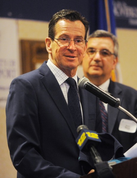 Governor Dannel P. Malloy fields questions after speaking at the Bridgeport Regional Business Council's Capitol Luncheon at the Holiday Inn  in Bridgeport, Conn. on Thursday, April 16, 2015. With Malloy if Stuart Marcus, CEO of St. Vincent's Medical Center.