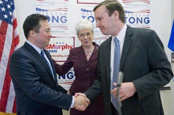 3740 x 2470~~$~~State Rep. William Tong, D-Stamford, left, shakes hands with U.S. Rep. Chris Murphy as Lt. Gov. Nancy Wyman, center, looks on after Tong announced he is dropping out of the race for U.S. Senate and endorsing Murphy, at a news conference at Goodwin College in East Hartford, Conn., Tuesday, May 1, 2012.  (AP Photo/Jessica Hill)